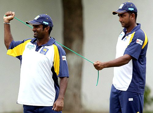 Muttiah Muralitharan does a bit of stretching