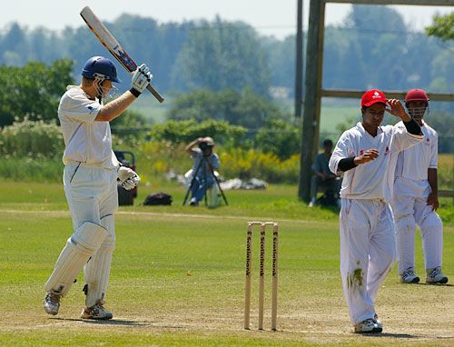 Douglas Lockhart takes the applause as he passes 150