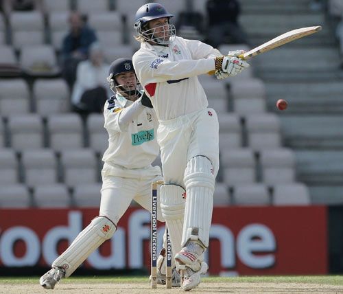 Luke Sutton swipes the ball towards midwicket
