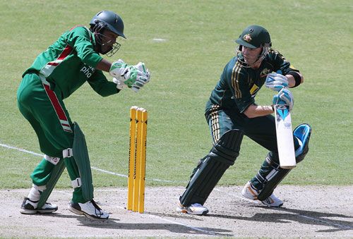 Dhiman Ghosh takes the catch to remove Michael Clarke for 14 in the first one-day international in Darwin