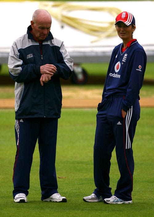 Jack Birkenshaw and Charlotte Edwards await the start of play