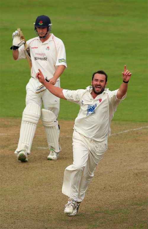 Steffan Jones celebrates bowling Steven Croft