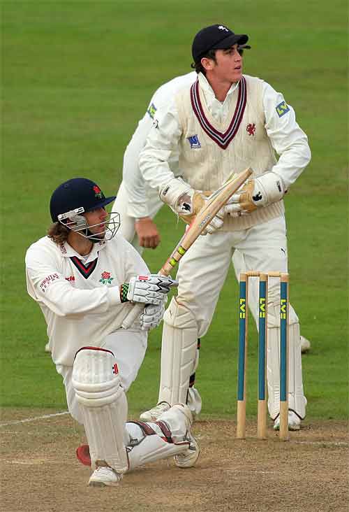 Luke Sutton took Lancashire into the lead with a stubborn 49