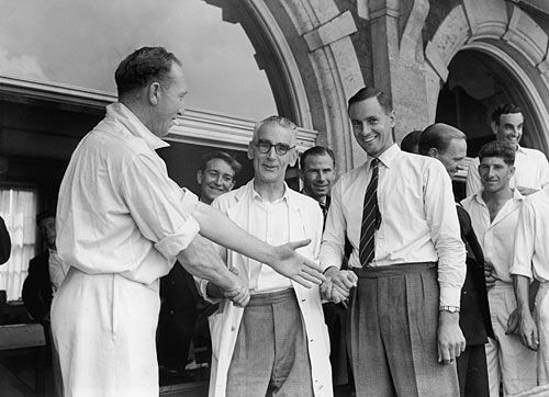 Stuart Surridge, Surrey masseuse Sandy Tait and Peter May shake hands
