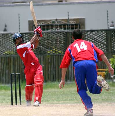 Butt Hussain drives down the ground during his 99