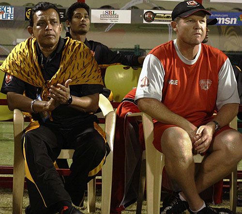 Royal Bengal Tigers coach Daryll Cullinan and stakeholder Mithun Chakraborty watch the match
