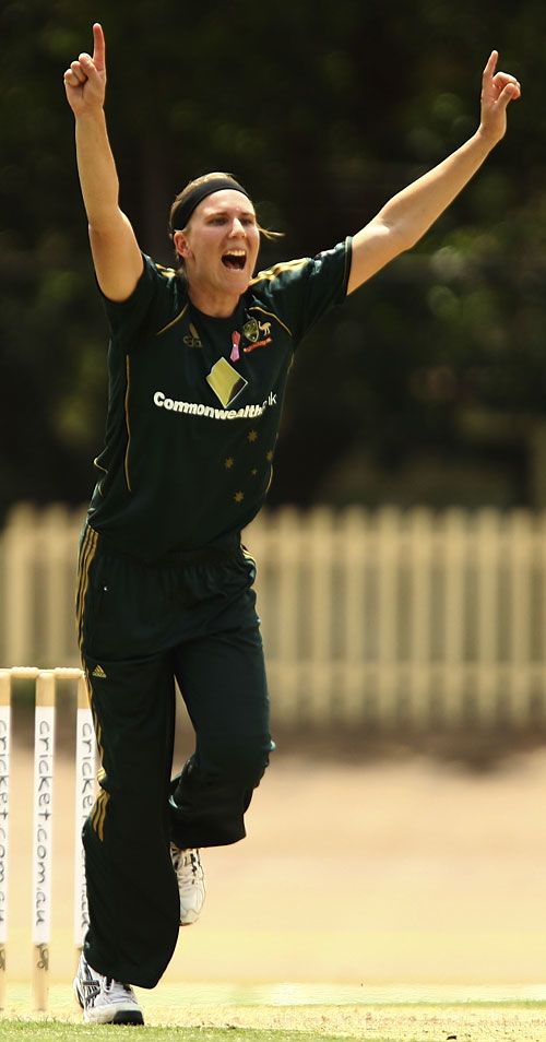 Emma Sampson celebrates after taking an Indian wicket