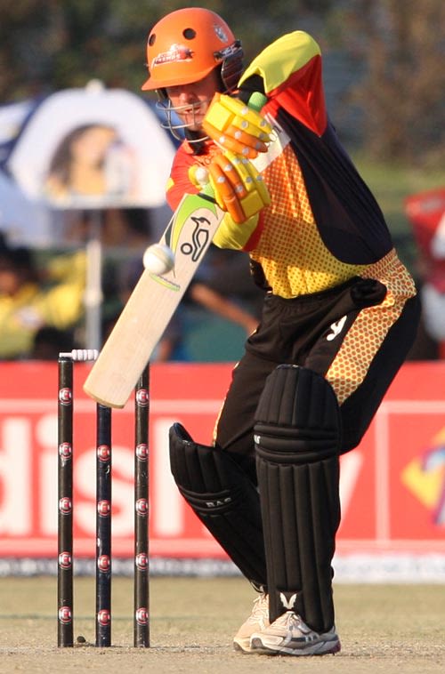 Nathan Astle prepares to play a shot during his unbeaten 68