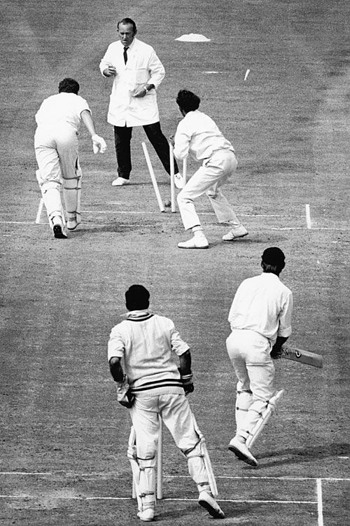 John Jameson is short of his crease as the ball deflects off Bhagwath Chandrasekhar's fingers onto the stumps