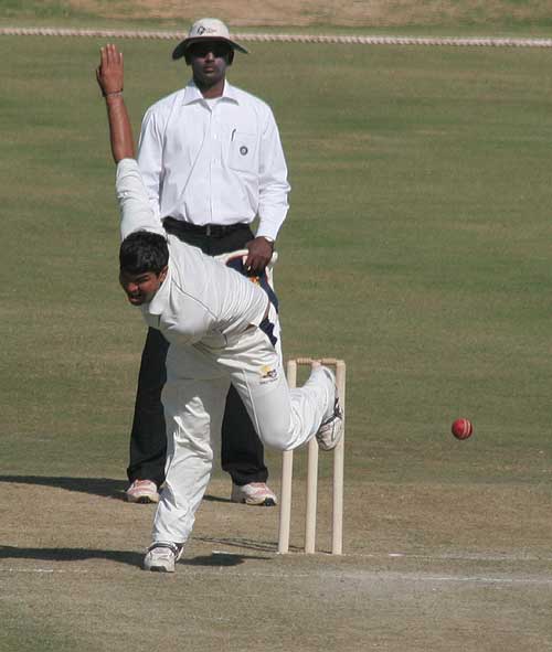 Himachal Pradesh's Ashok Thakur bowls against Kerala