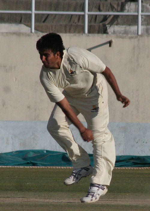 Vikramjeet Malik delivers the ball