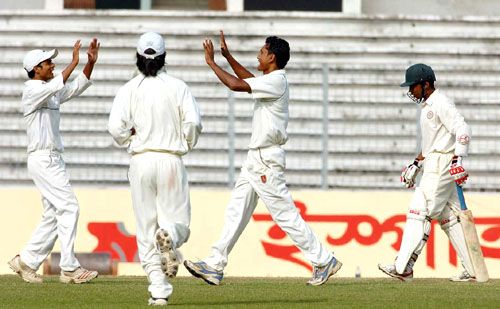 Dhaka batsman Anwar Hossain was dismissed by Saikat Ali