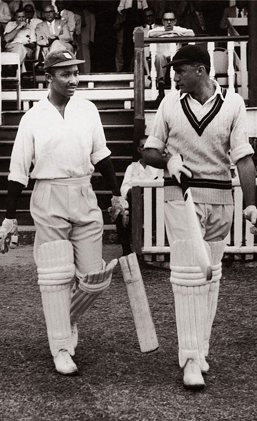 Frank Worrell and Jeff Stollmeyer walk in to bat