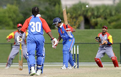 Sudesh Dhaniram is clean bowled by Khurram Chohan