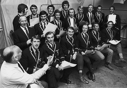 Brian Johnston conducts the English team in a rendition of 'The Ashes Song'