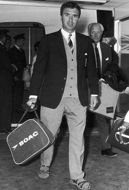 Fred Titmus arrives in London after losing four toes in a boating accident