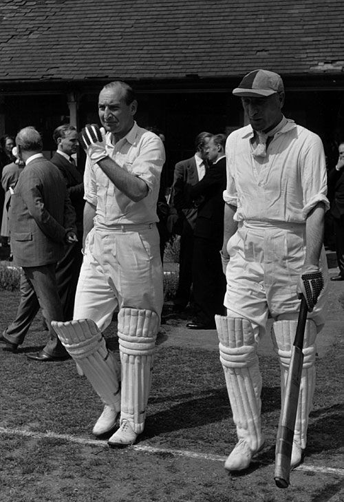 Douglas Jardine walks in to bat in a charity match