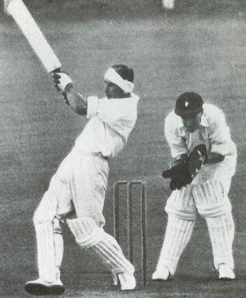 Bert Sutcliffe lofts Hugh Tayfield for a six