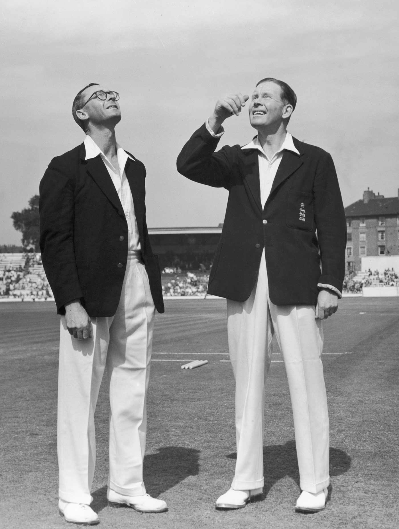 New Zealand captain Walter Hadlee watches as England captain Freddie Brown tosses the coin