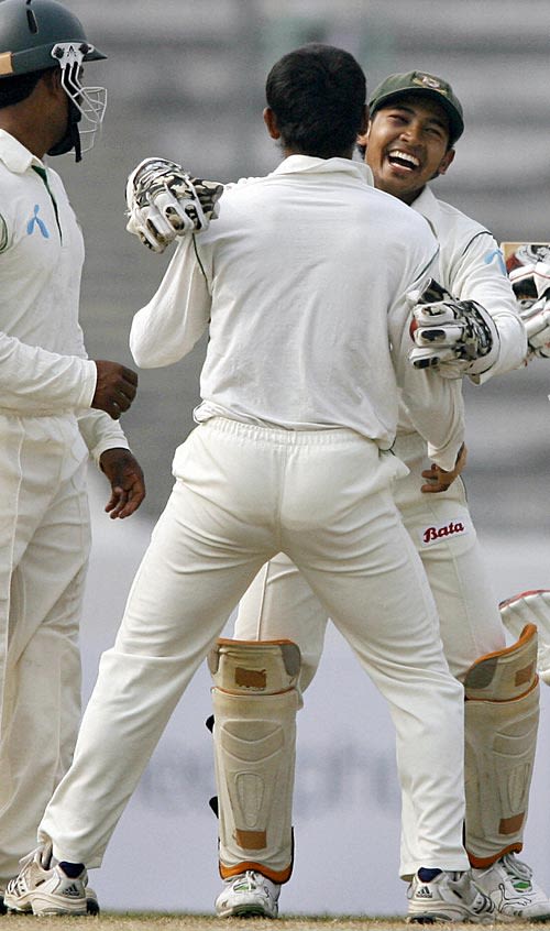 Mehrab Hossain jnr gets a hug from Mushfiqur Rahim after dismissing Kumar Sangakkara