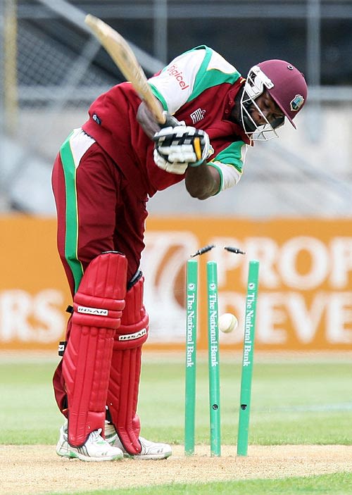 Shawn Findlay has his stumps rearranged by Tim Southee