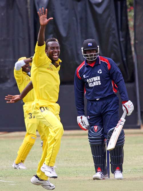 The in-form Kenneth Kamyuka puts in a strong appeal as Cayman Islands struggle