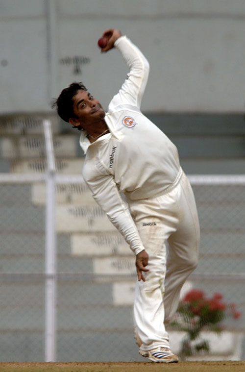 Rajesh Pawar bowls