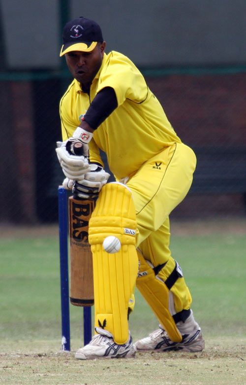 Uganda's Akbar Baig is rapped on the pads