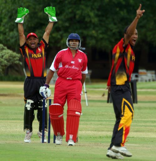 Hong Kong's Manoj Cheruparambil is trapped lbw by Loa Nou