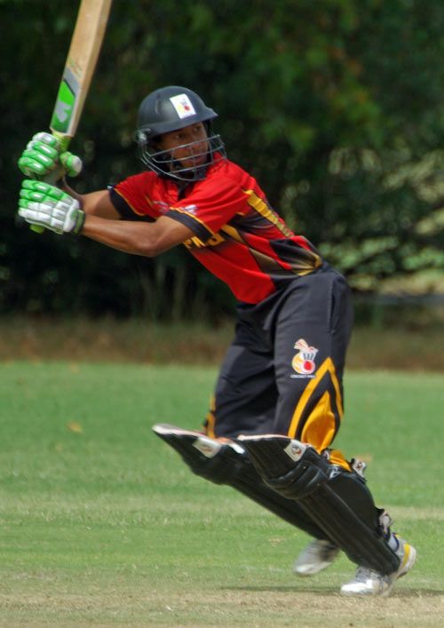Papua New Guinea's Vani Morea flicks the ball