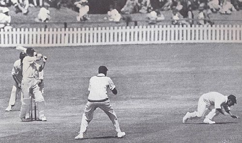 Ken Viljoen pulls past Bill Edrich at short leg