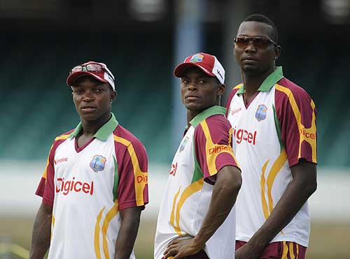 Fidel Edwards, Daren Powell and Sulieman Benn hang around