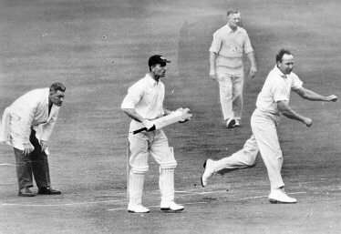 Wilf Wooller bowling in 1954