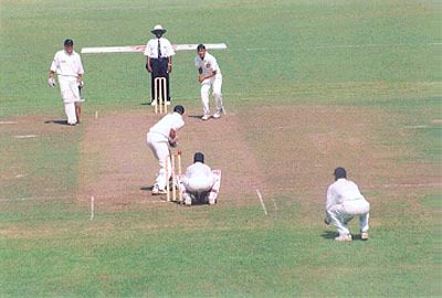 Left arm spinner Anup Dave bowling