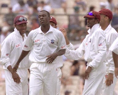 Colin Stuart being congratulated by his team as he sent back Ponting