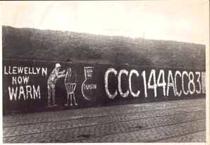The wall between Accrington and Church with the cricket scores appended