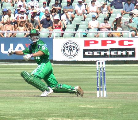 Doug Watson loses his bat as he flicks a ball to the fine leg boundary