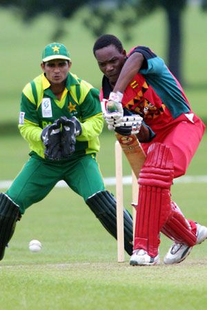 Masakadza plays a defensive shot as Amin looks on. ICC Under-19 World Cup Warmup: Pakistan Under-19 v Zimbabwe Under-19 at Christchurch, 16 Jan 2002.
