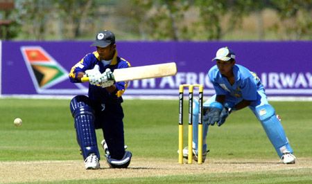 Sylvester shapes to sweep a delivery as Patel looks on. ICC Under-19 World Cup Super League Group 1: India Under-19s v Sri Lanka Under-19s at Lincoln, 29 Jan 2002