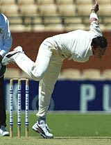 Mark Cleary on his way to a four-wicket haul