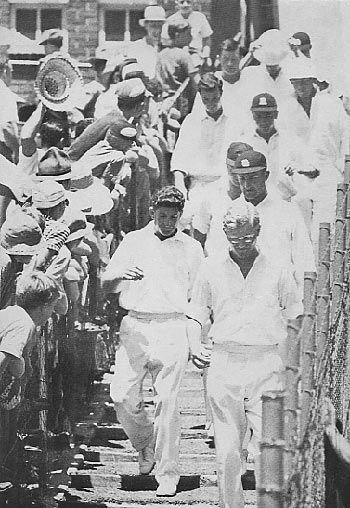 Mike Smith leads England out to field