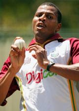Merv Dillon bowls in the nets