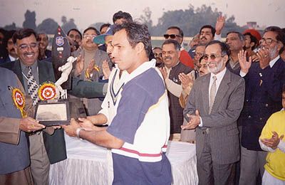 The skippers Robin and Khurasiya pose with the Deodhar Trophy