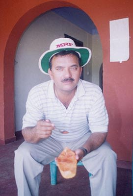North Zone selector Madan Lal relishes a snack