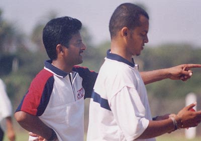 Murali Kartik and Raju line up to bowl at the nets