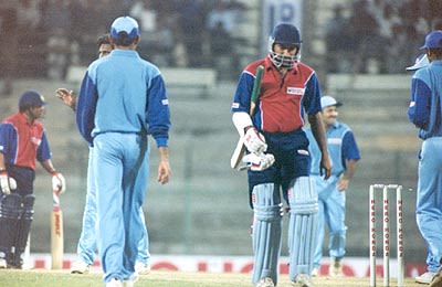 Khurasiya walks back after being trapped LBW by Srinath
