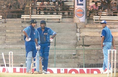 Martin and Agarkar await the third umpires' call