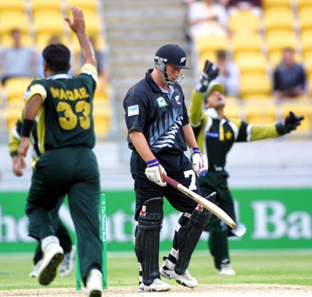 Waqar celebrates the dismissal of Twose caught behind by Moin