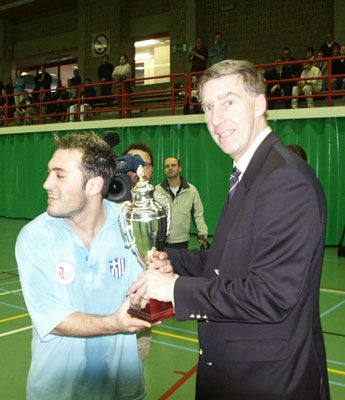 Roger Knight presents the Trophy to Greece
