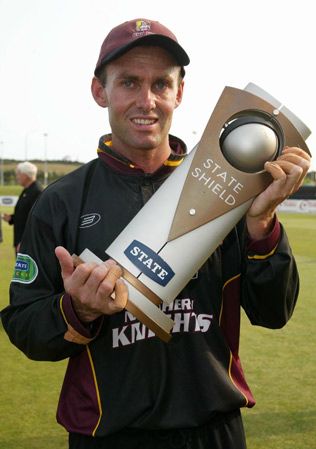 Hart holds the State Shield trophy. State Shield Final: Auckland v Northern Districts at Auckland, 1 Feb 2003